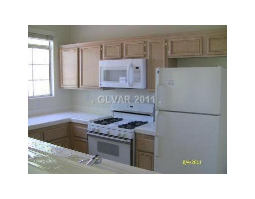 2201 Ramsgate Drive, Unit 128 Henderson, NV 89074 - Photo 7 of 20 Kitchen. BUILT IN MICROWAVE IN THIS KITCHEN WITH LOADS OF COUNTER SPACE!