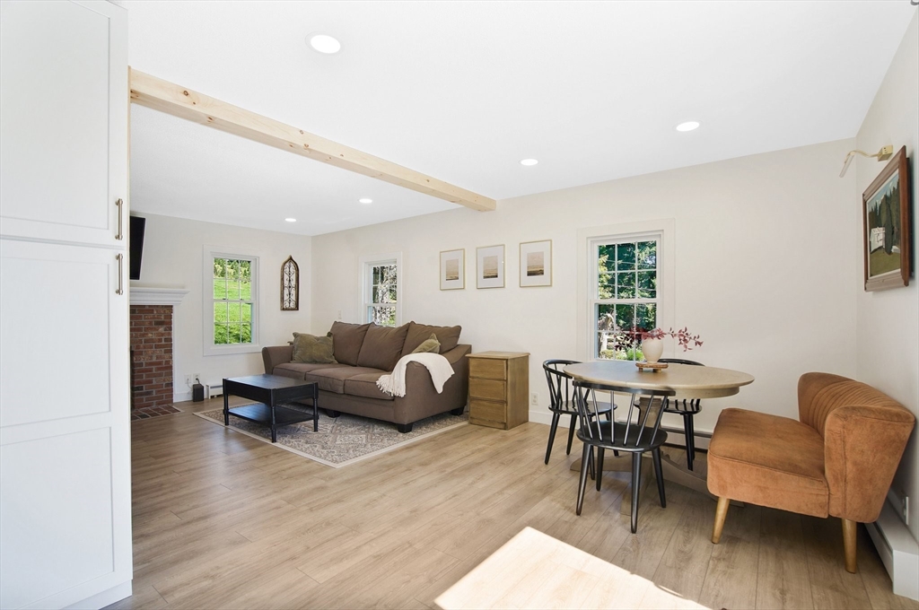 123 Stebbins Road Monson, MA 01057 - Photo 15 of 42 a living room with furniture and a wooden floor
