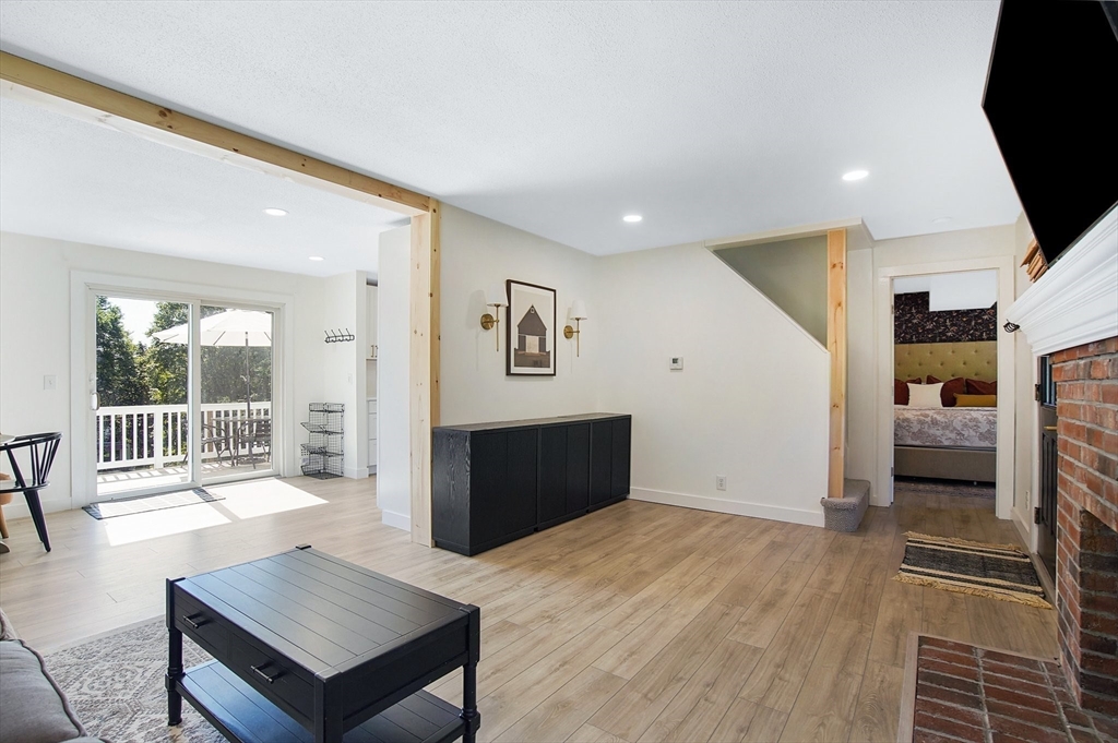 123 Stebbins Road Monson, MA 01057 - Photo 19 of 42 a living room with furniture and a flat screen tv