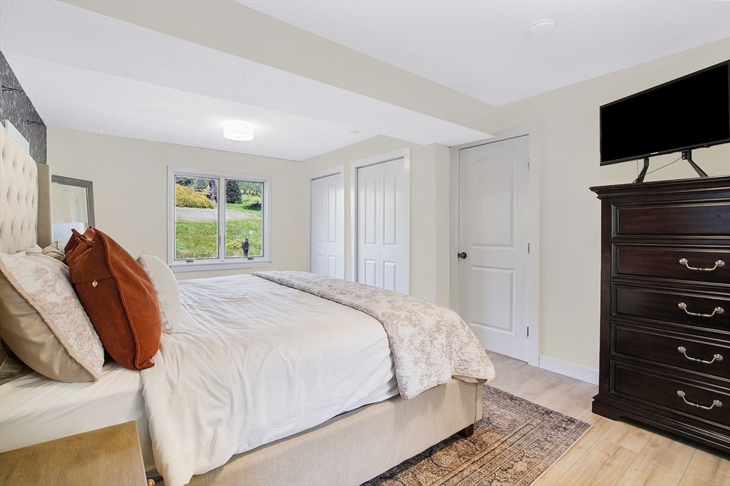 123 Stebbins Road Monson, MA 01057 - Photo 21 of 42 a bedroom with a bed and a television