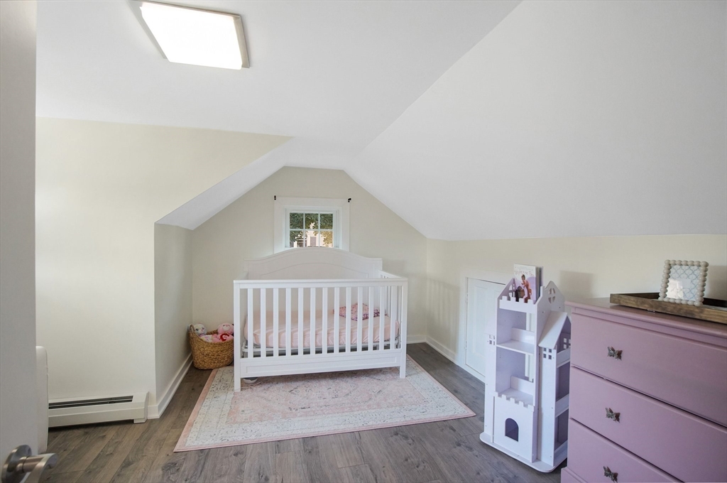 123 Stebbins Road Monson, MA 01057 - Photo 29 of 42 a view of a livingroom with a baby crib