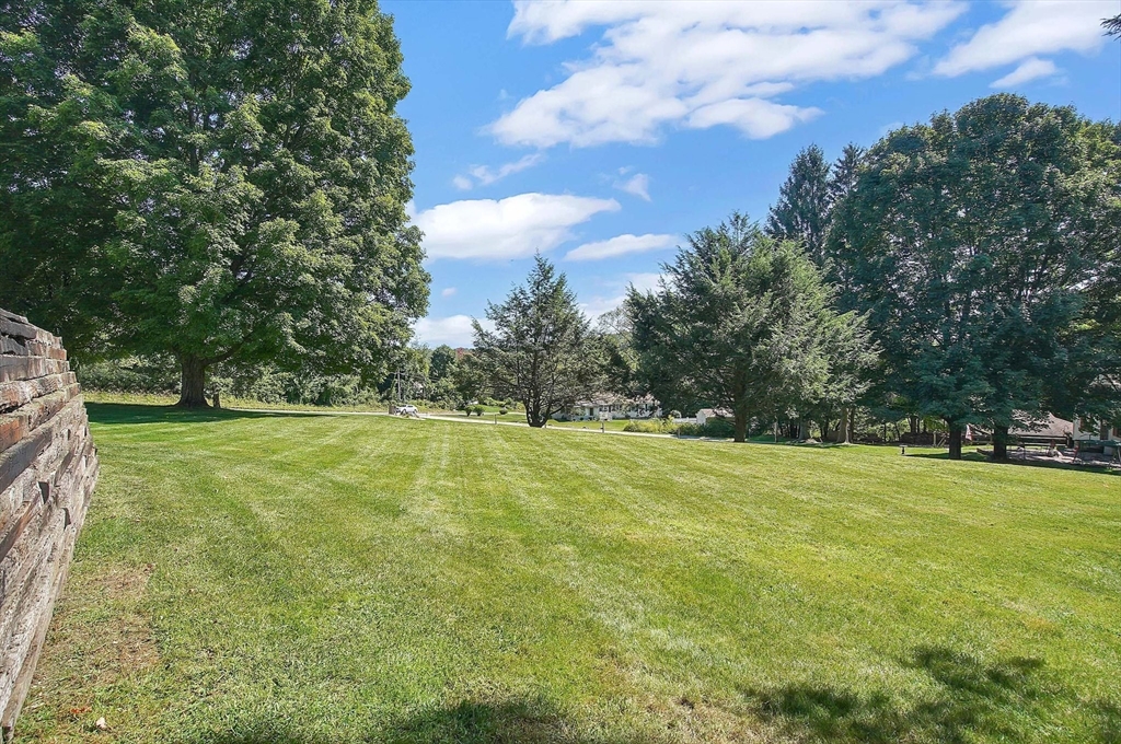 123 Stebbins Road Monson, MA 01057 - Photo 39 of 42 a view of a field with trees in the background