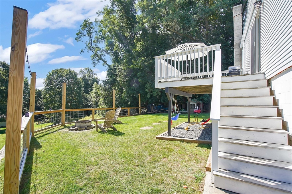 123 Stebbins Road Monson, MA 01057 - Photo 41 of 42 a view of a house with a yard patio and furniture