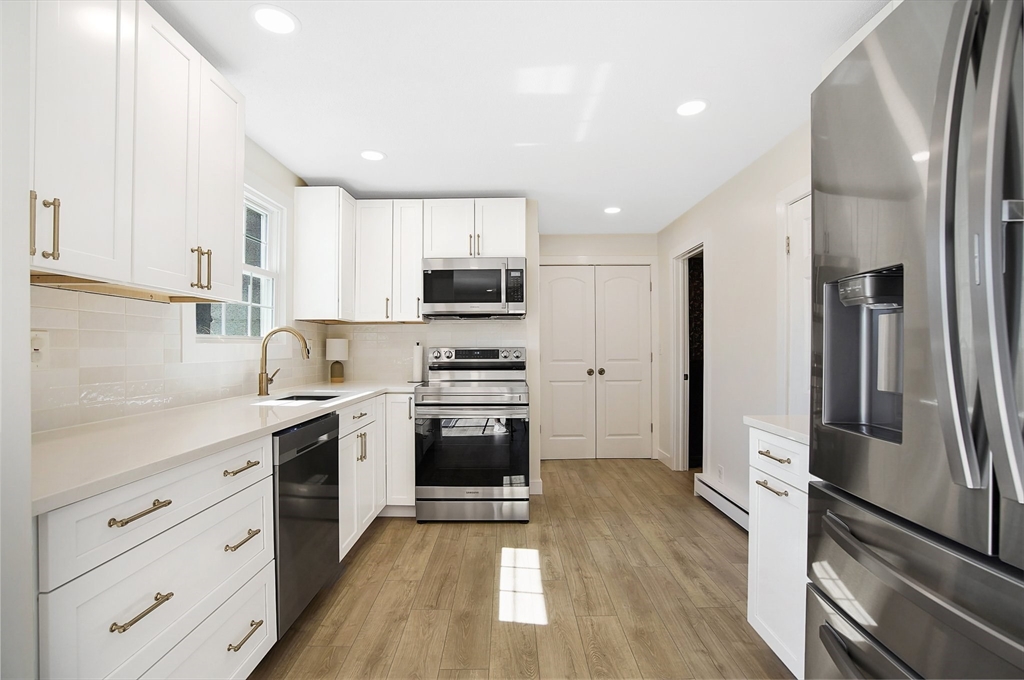123 Stebbins Road Monson, MA 01057 - Photo 9 of 42 a kitchen with stainless steel appliances a refrigerator sink and microwave