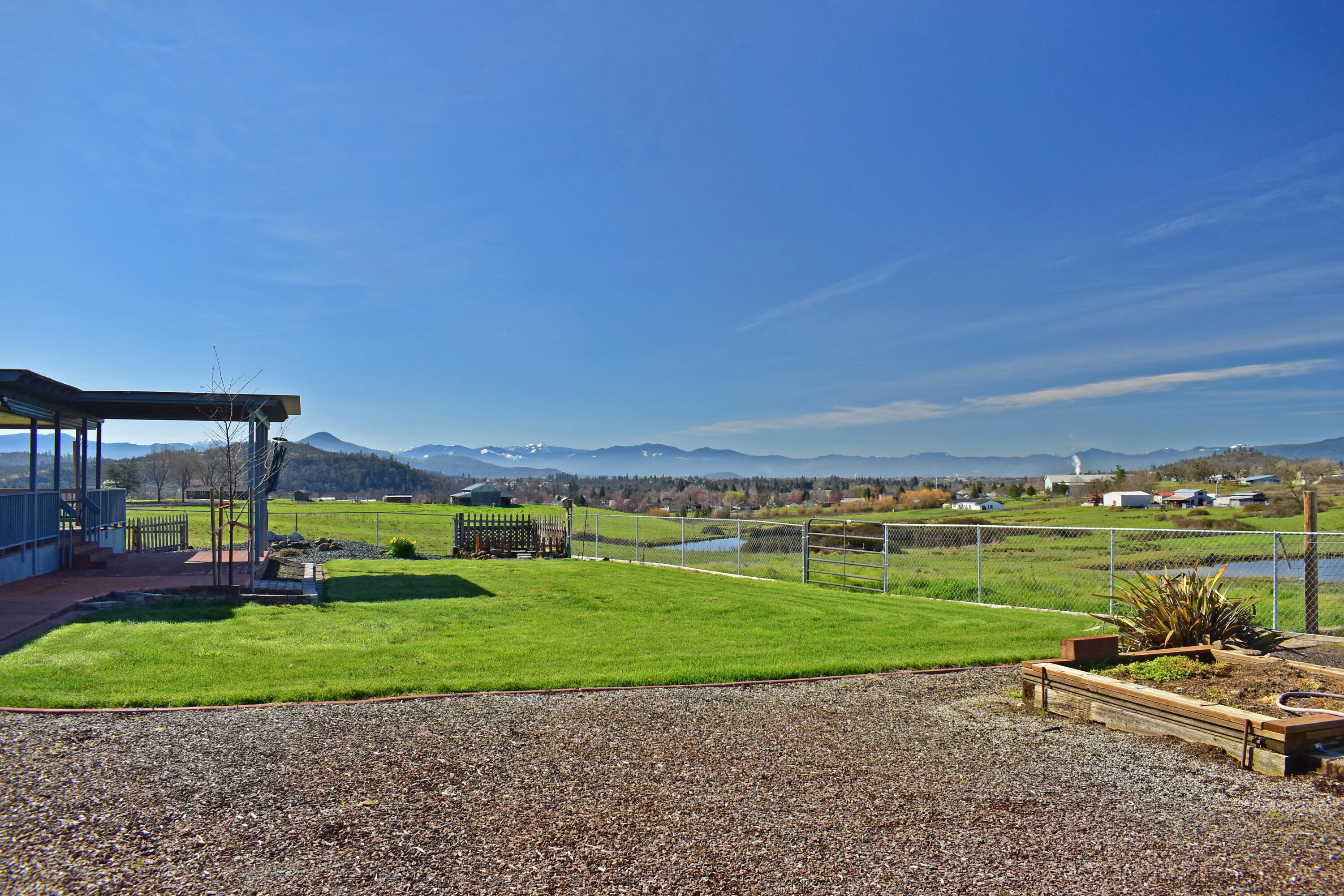 865 Reese Creek Road Eagle Point, OR 97524 - Photo 2 of 37 a view of a golf course with a park