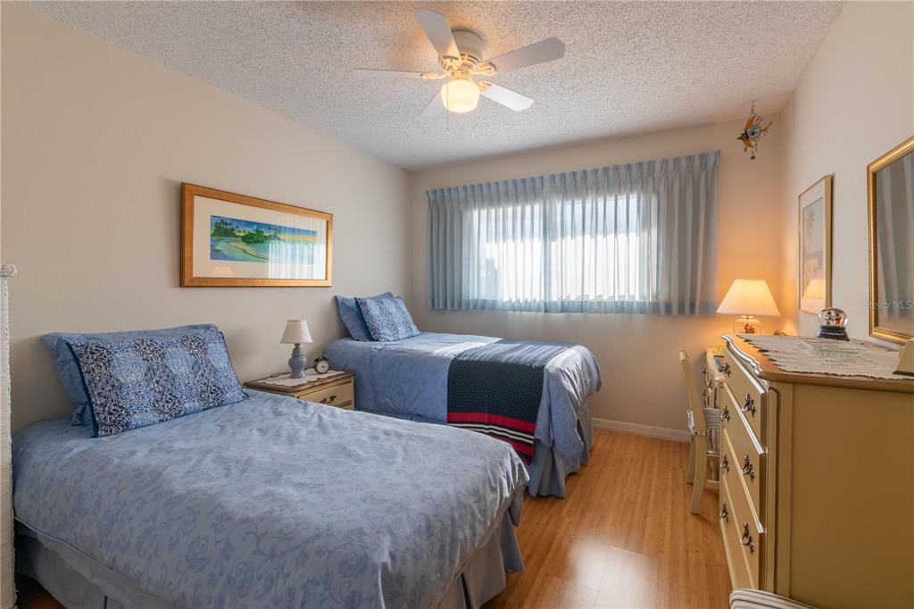 2310 Denmark Street, Unit 46 Clearwater, FL 33763 - Photo 21 of 44 a bedroom with a bed and window
