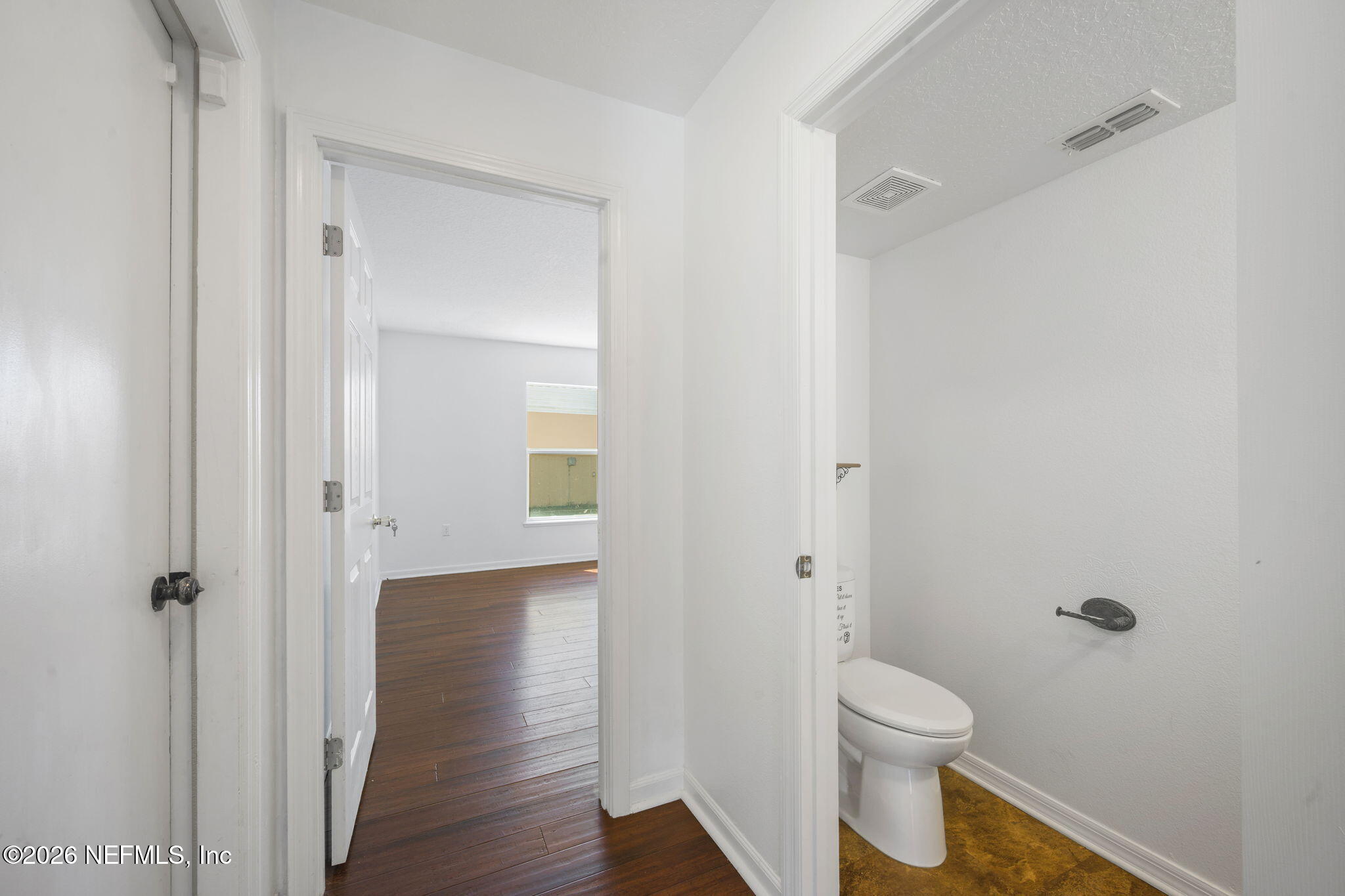 5470 Turkey Creek Road Jacksonville, FL 32244 - Photo 19 of 49 a bathroom view of a toilet and a hardwood