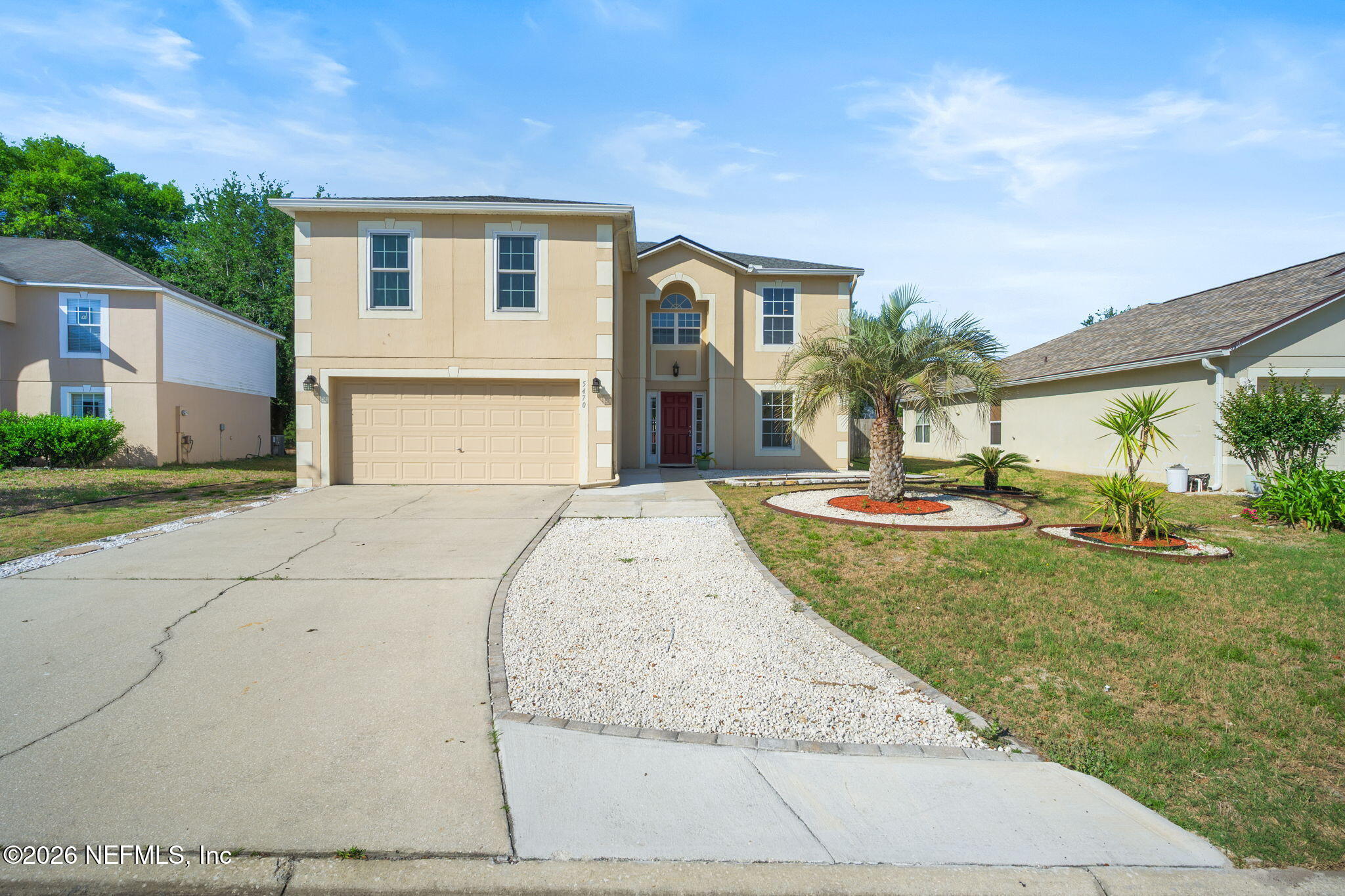 5470 Turkey Creek Road Jacksonville, FL 32244 - Photo 2 of 49 a front view of a house with a yard