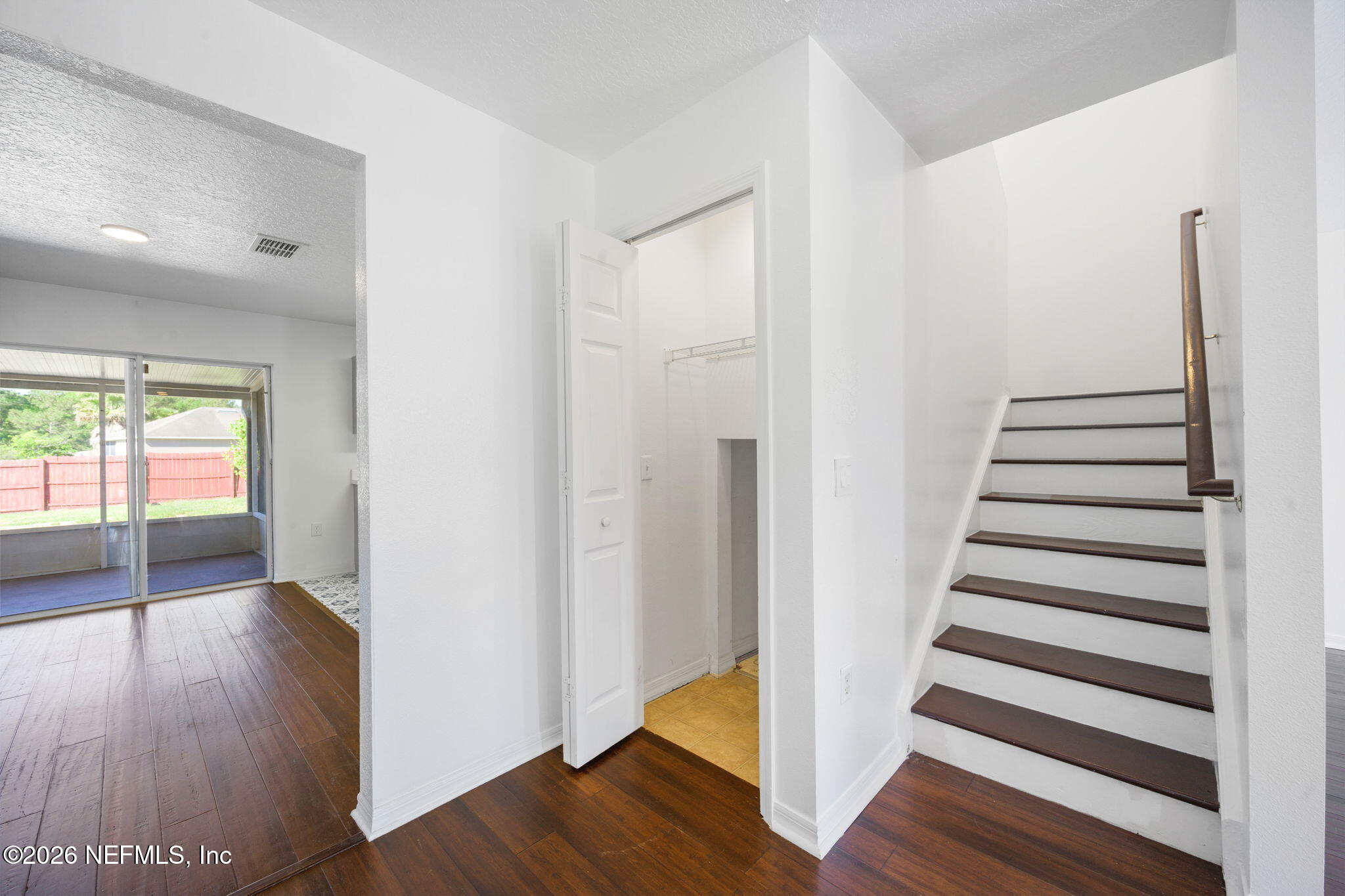 5470 Turkey Creek Road Jacksonville, FL 32244 - Photo 22 of 49 a view of a hallway with wooden floor and windows