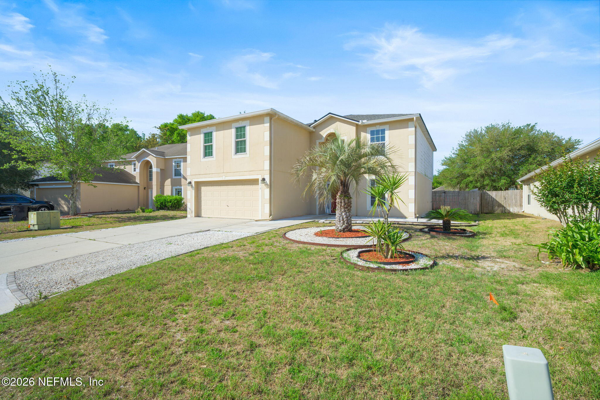 5470 Turkey Creek Road Jacksonville, FL 32244 - Photo 3 of 49 a view of a house with backyard and sitting area