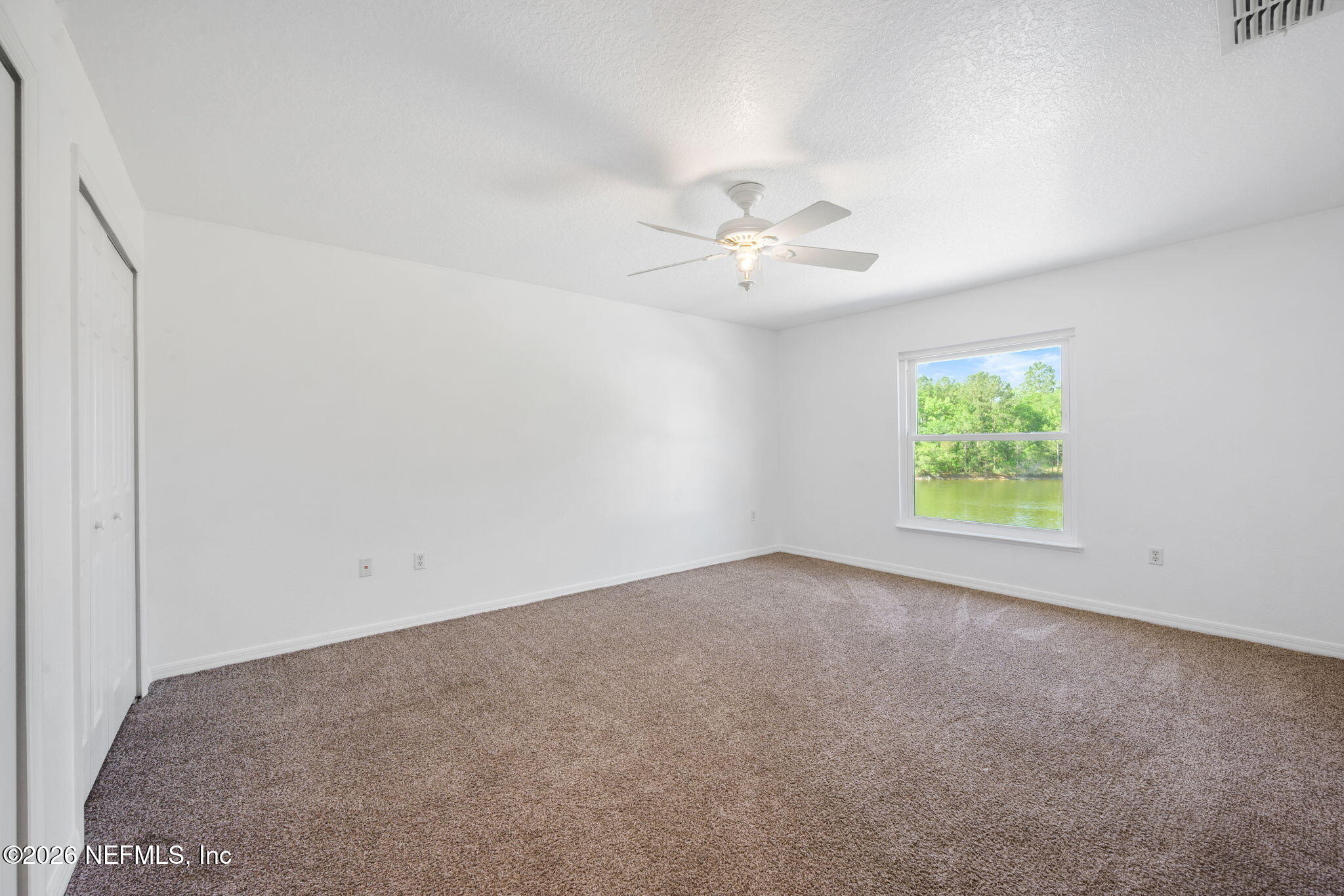 5470 Turkey Creek Road Jacksonville, FL 32244 - Photo 35 of 49 an empty room with a window