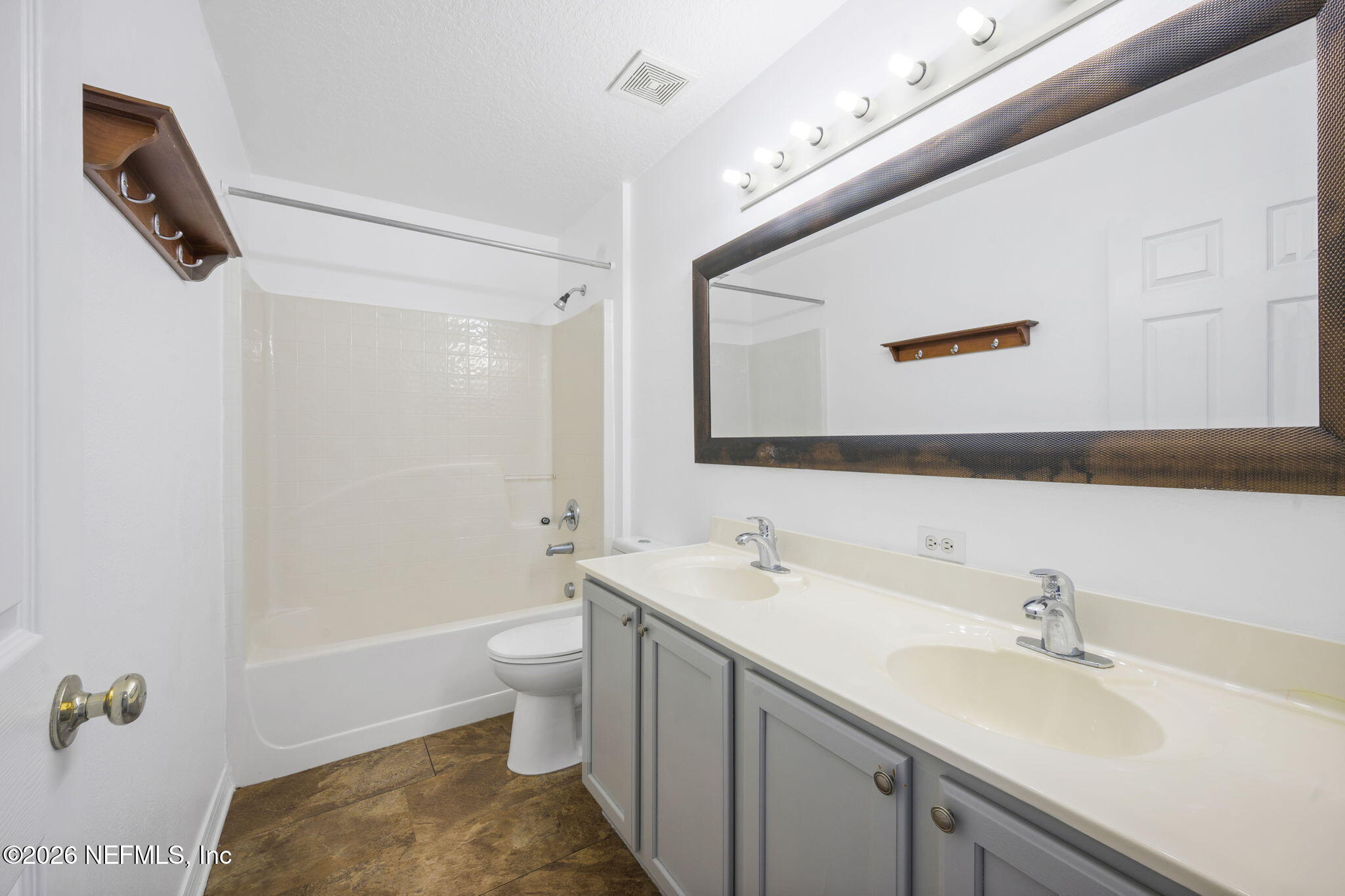 5470 Turkey Creek Road Jacksonville, FL 32244 - Photo 37 of 49 a bathroom with a sink a toilet and shower