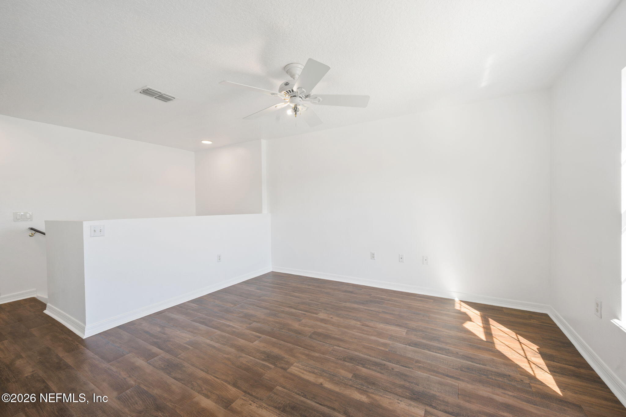 5470 Turkey Creek Road Jacksonville, FL 32244 - Photo 39 of 49 a view of empty room with wooden floor
