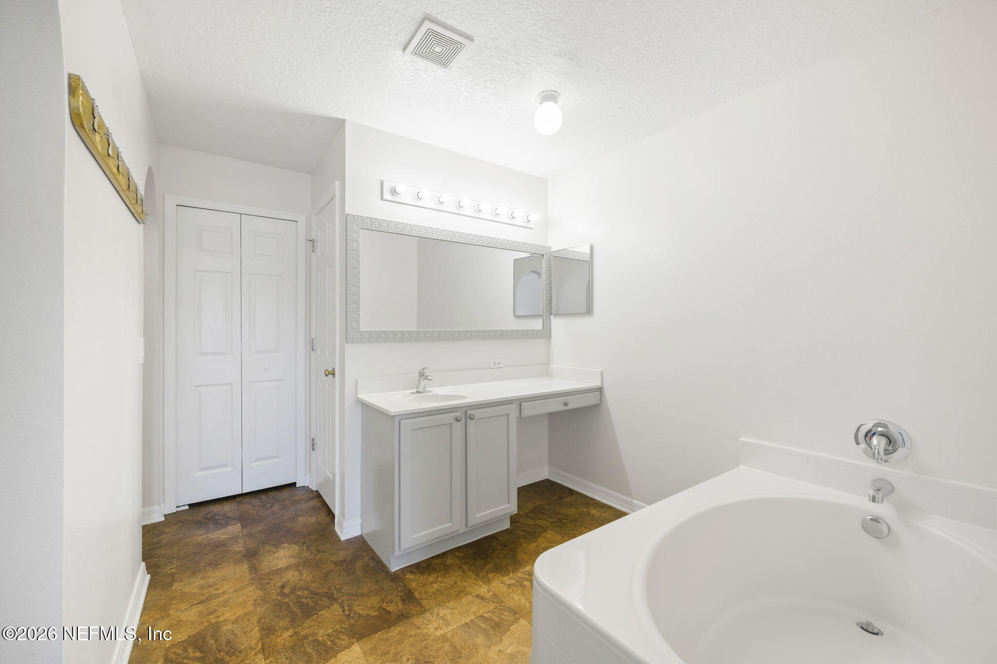 5470 Turkey Creek Road Jacksonville, FL 32244 - Photo 44 of 49 a bathroom with a sink and a tub