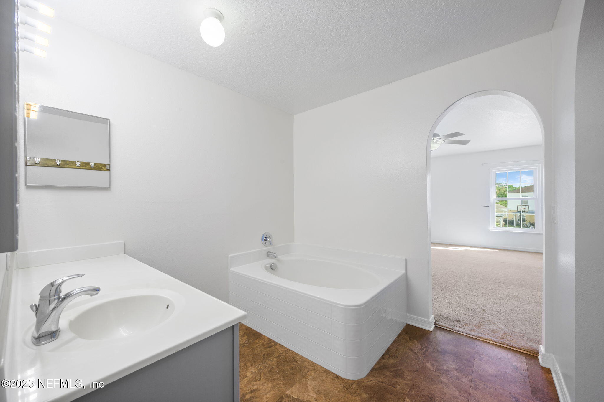 5470 Turkey Creek Road Jacksonville, FL 32244 - Photo 46 of 49 a bathroom with a sink and a bathtub