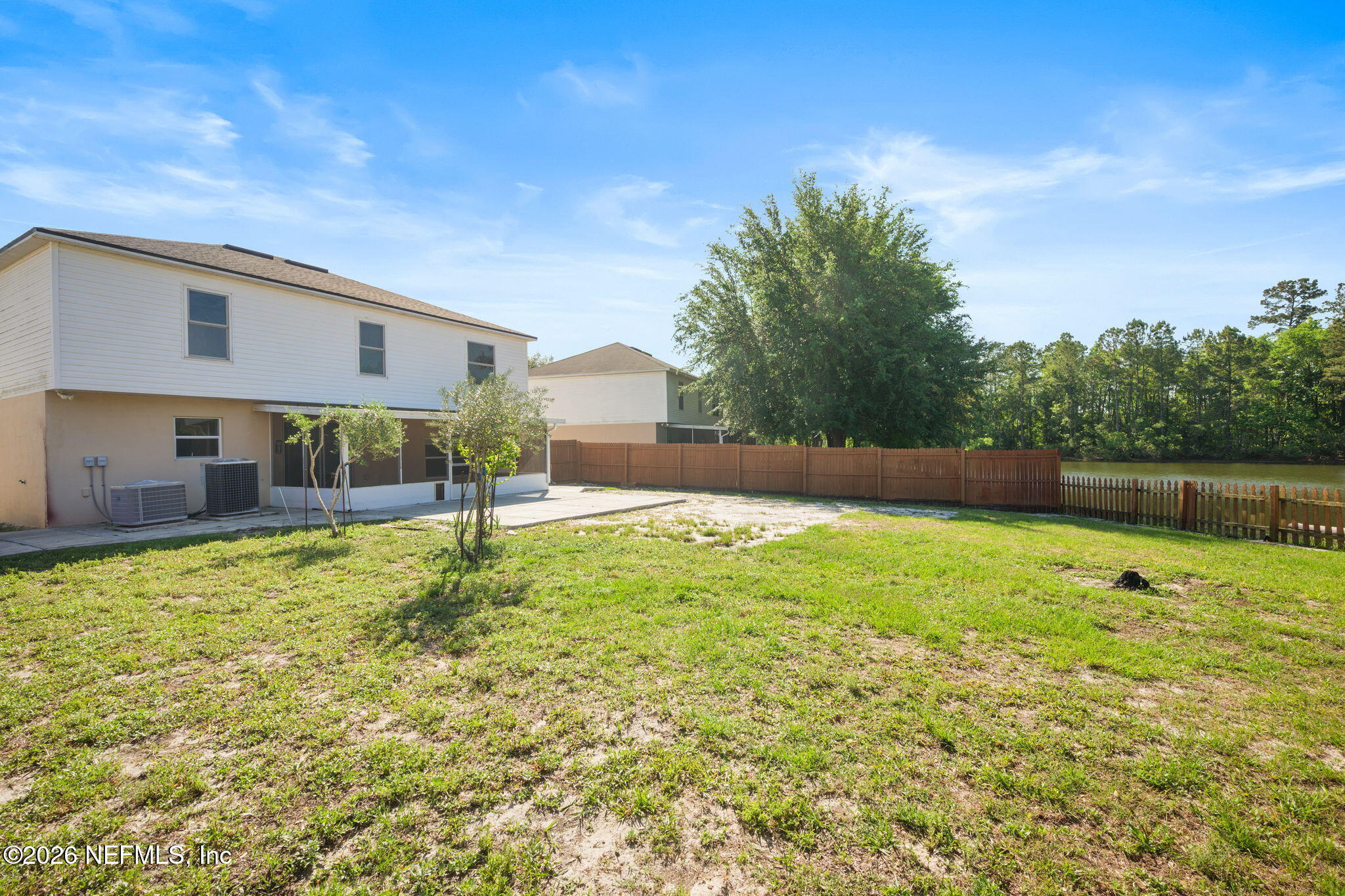 5470 Turkey Creek Road Jacksonville, FL 32244 - Photo 7 of 49 a view of a backyard with a garden and plants