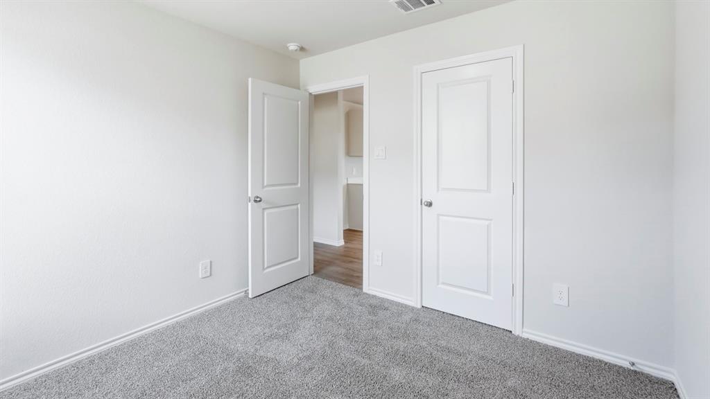 3319 Twilight Trail Forney, TX 75126 - Photo 28 of 33 Room featuring neutral gray carpeting and white walls