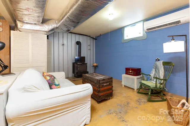 a living room with furniture and a table