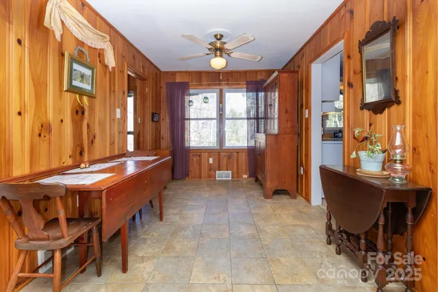 a kitchen with stainless steel appliances granite countertop a stove and a refrigerator