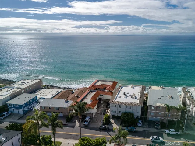 a view of building with an outdoor space and seating