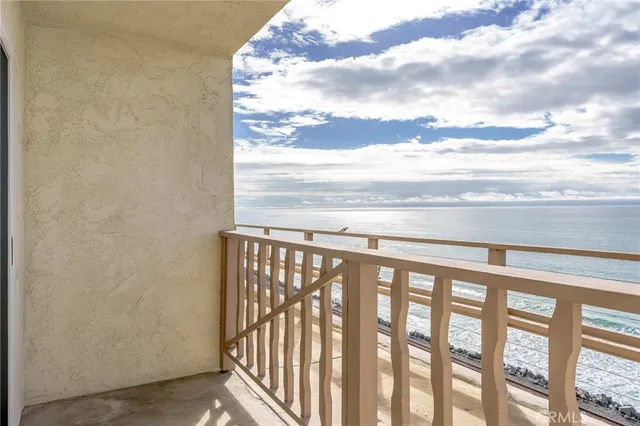 a view of a balcony with an outdoor space
