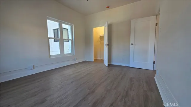 a view of wooden floor in an empty room