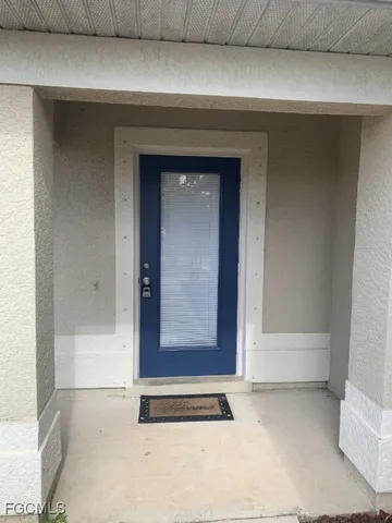 a kitchen with kitchen island a counter top space appliances and cabinets
