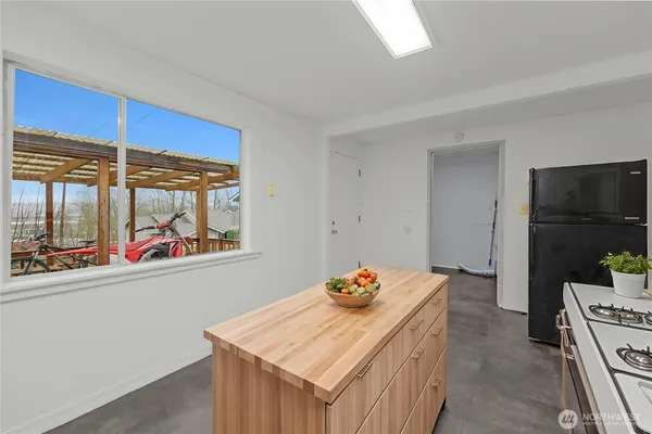 a view of a room with a large window