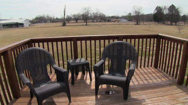 3704 Big Springs Road Lebanon, TN 37090 - Photo 14 of 20 a view of a chair and table on the wooden floor