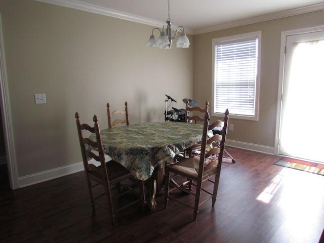 3704 Big Springs Road Lebanon, TN 37090 - Photo 4 of 20 a view of a dining room with furniture window and wooden floor