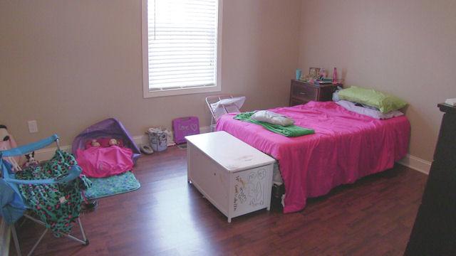 3704 Big Springs Road Lebanon, TN 37090 - Photo 7 of 20 a bedroom with a bed and a wooden floor