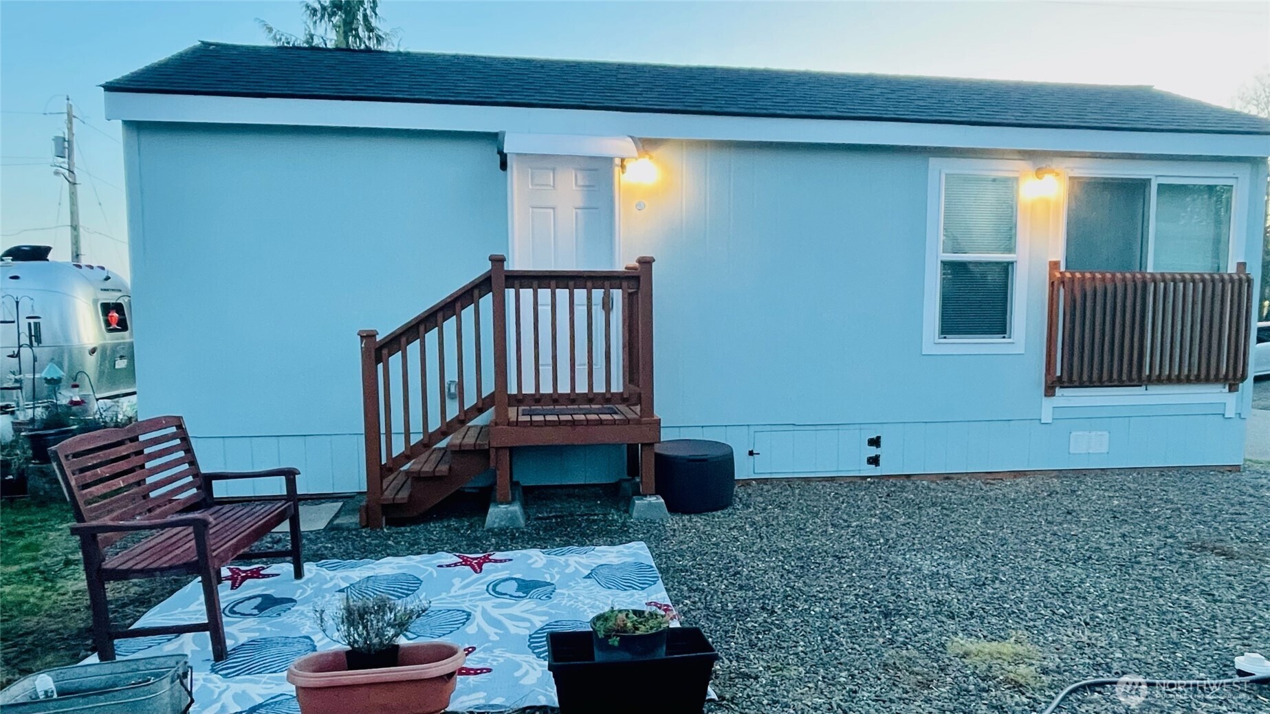 545 Hendricks Street, Unit 10A Port Townsend, WA 98368 - Photo 15 of 17 a living room with furniture and a rug
