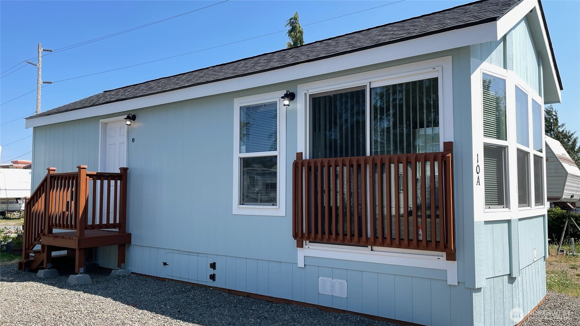 545 Hendricks Street, Unit 10A Port Townsend, WA 98368 - Photo 17 of 17 a view of a porch with a chair