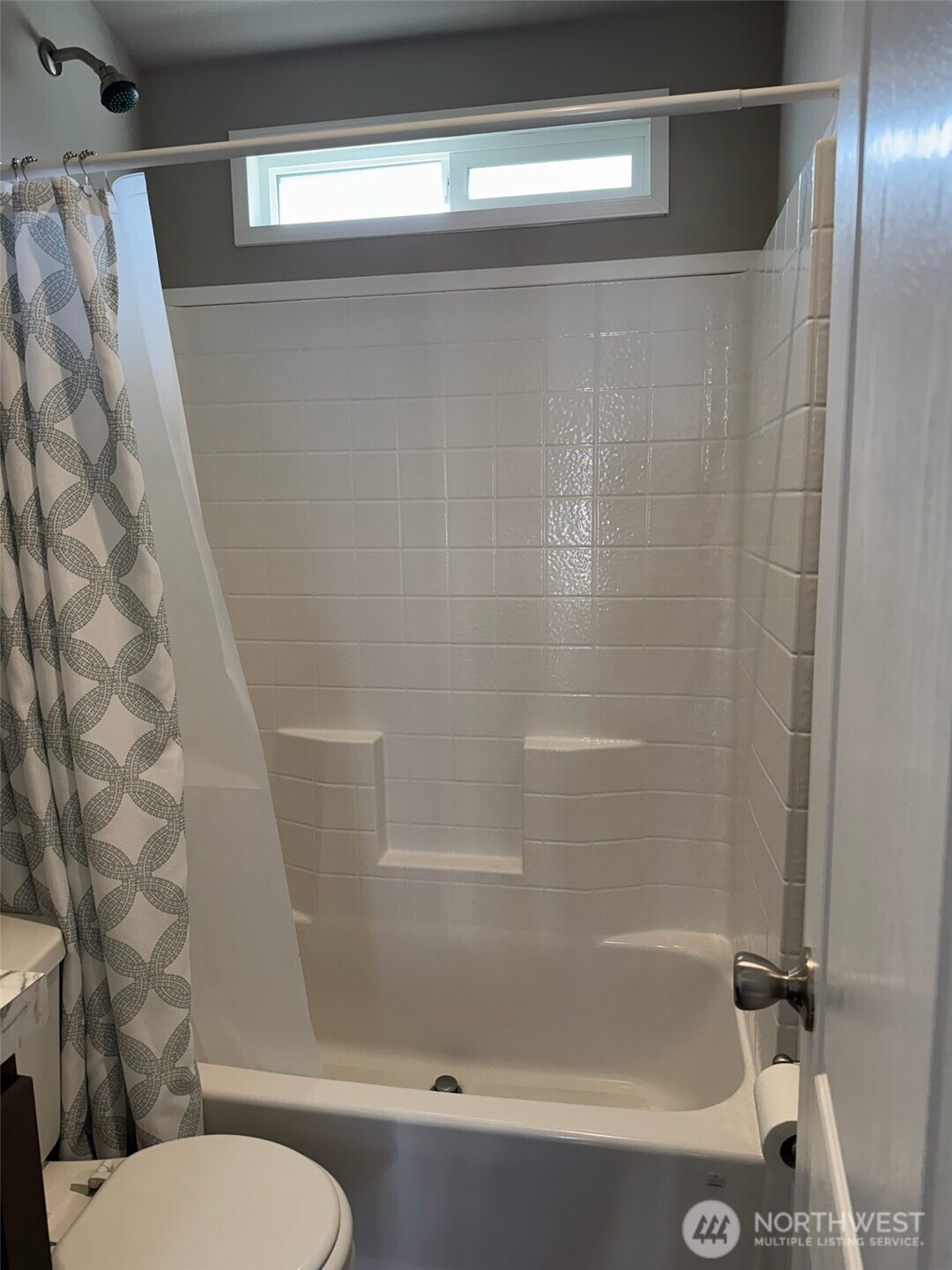 545 Hendricks Street, Unit 10A Port Townsend, WA 98368 - Photo 9 of 17 a bathroom with a shower and a toilet