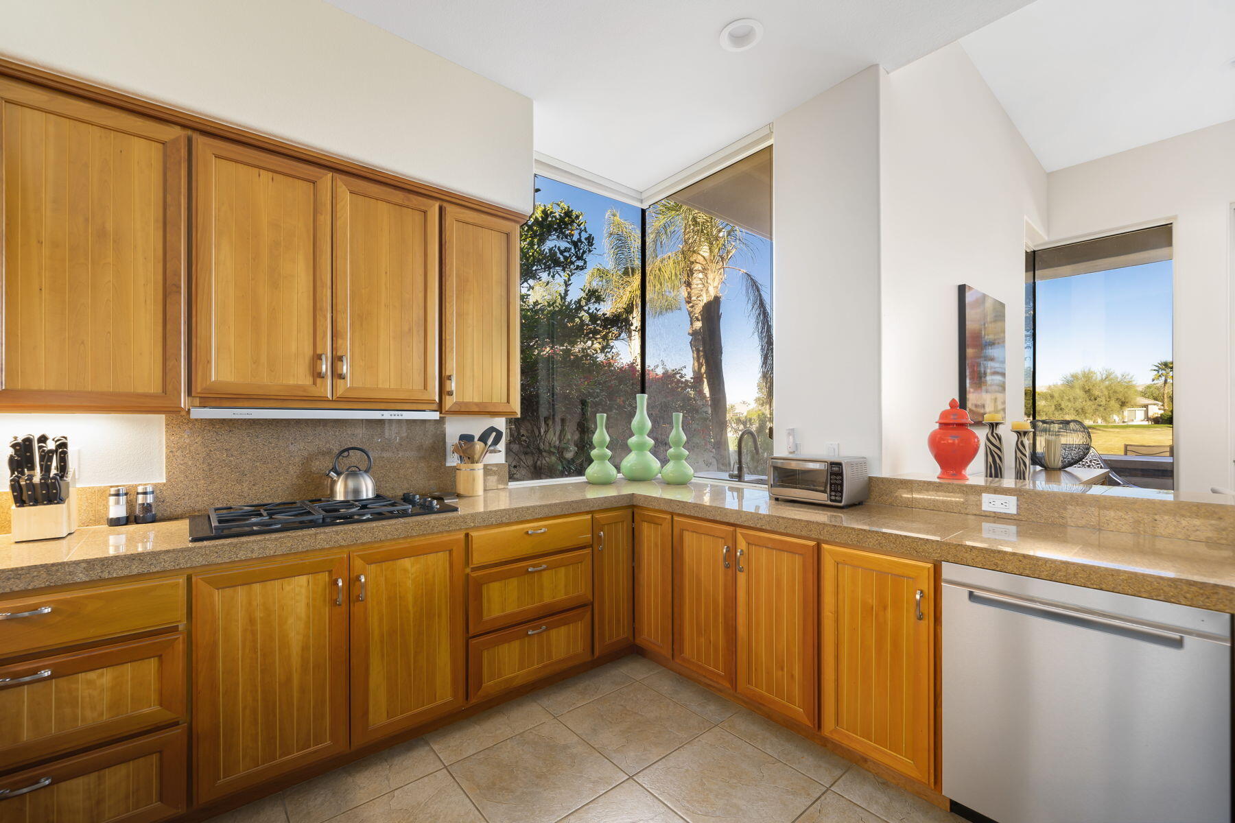 253 Loch Lomond Road Rancho Mirage, CA 92270 - Photo 11 of 66 a kitchen with a sink and cabinets