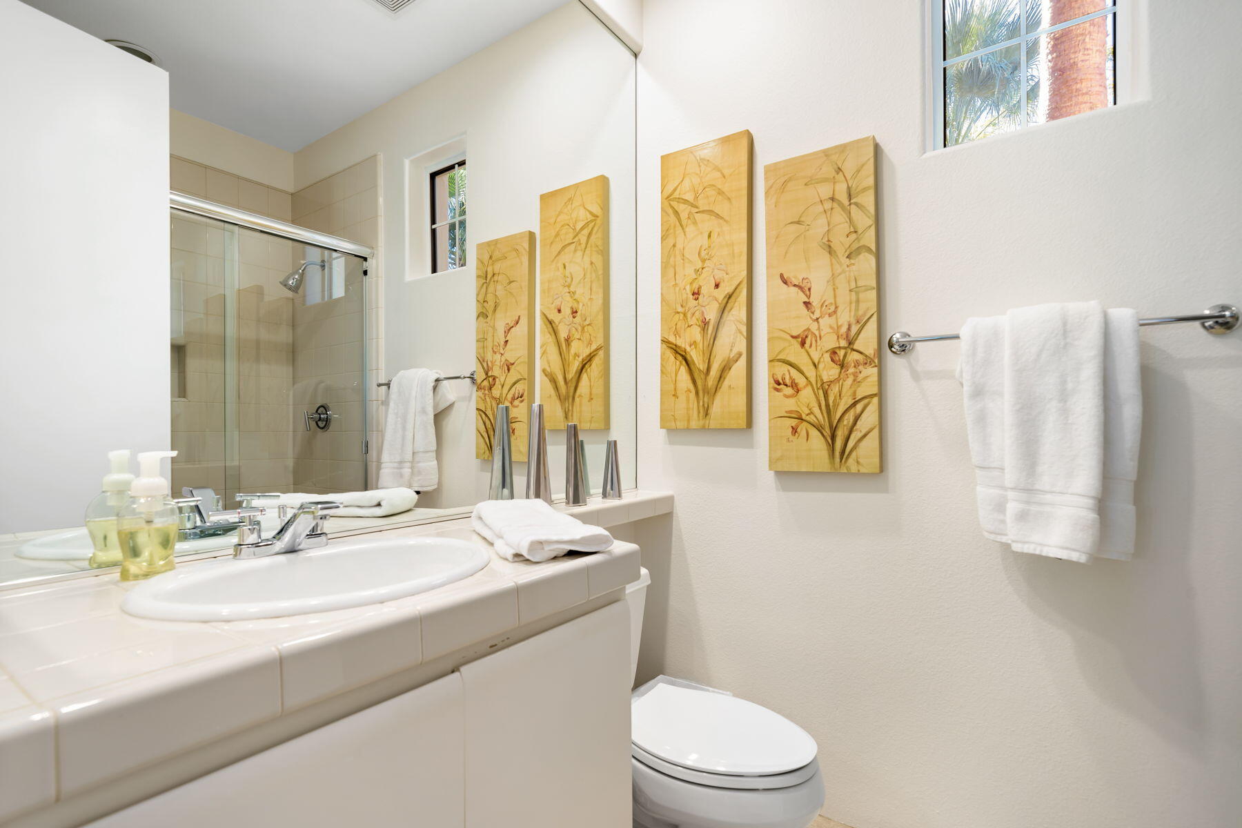 253 Loch Lomond Road Rancho Mirage, CA 92270 - Photo 30 of 66 a bathroom with a granite countertop sink and a mirror
