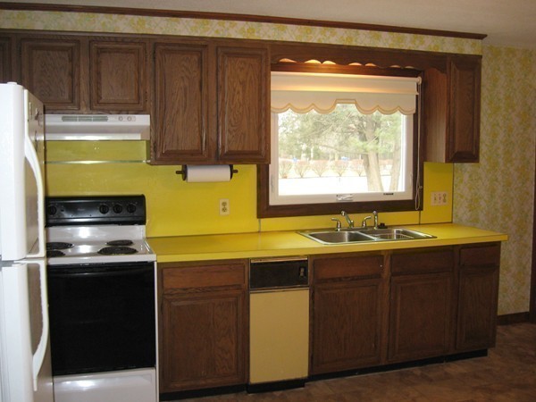 657 Amostown Road West Springfield, MA 01089 - Photo 11 of 29 a kitchen with a sink and a window
