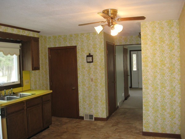 657 Amostown Road West Springfield, MA 01089 - Photo 13 of 29 a bathroom with a mirror sink and vanity