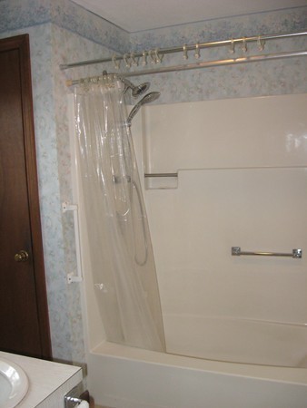 657 Amostown Road West Springfield, MA 01089 - Photo 18 of 29 a bathroom with a shower and a toilet