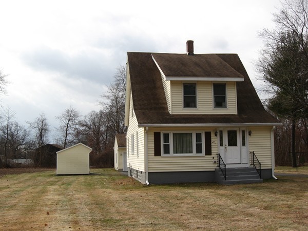 657 Amostown Road West Springfield, MA 01089 - Photo 20 of 29 a front view of a house with a yard
