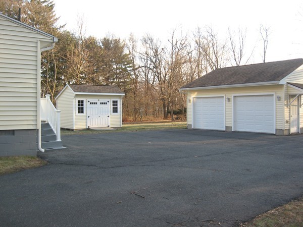 657 Amostown Road West Springfield, MA 01089 - Photo 22 of 29 a view of backyard of house