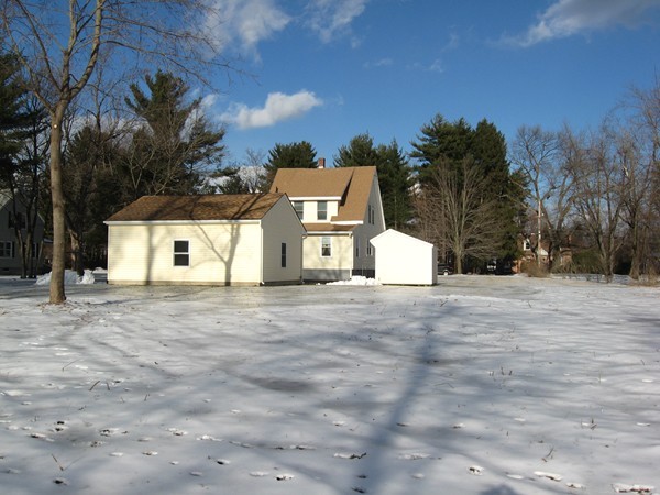 657 Amostown Road West Springfield, MA 01089 - Photo 26 of 29 a front view of a house with a yard
