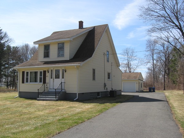 657 Amostown Road West Springfield, MA 01089 - Photo 28 of 29 a front view of a house with a yard