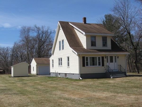657 Amostown Road West Springfield, MA 01089 - Photo 29 of 29 a front view of a house with a yard