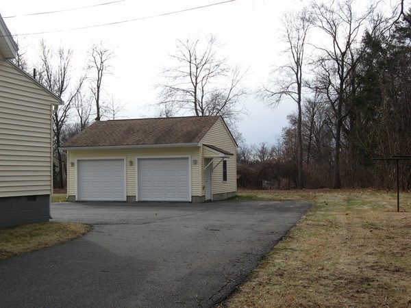 657 Amostown Road West Springfield, MA 01089 - Photo 4 of 29 a view of a house with a yard