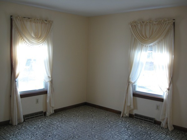 657 Amostown Road West Springfield, MA 01089 - Photo 8 of 29 a room with a window