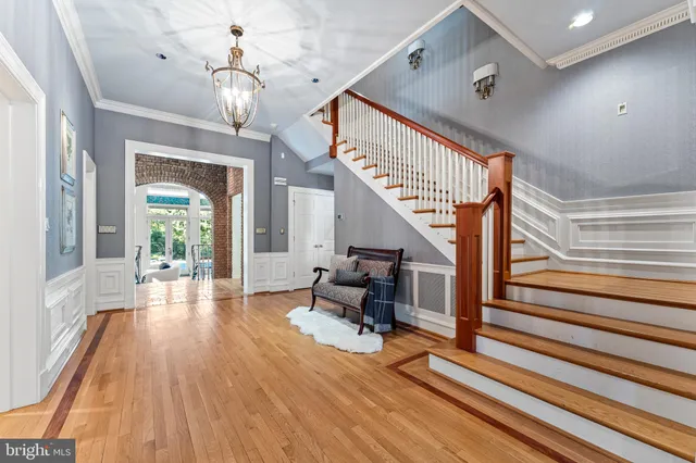 a kitchen with stainless steel appliances granite countertop wooden cabinets a stove top oven a sink and dishwasher