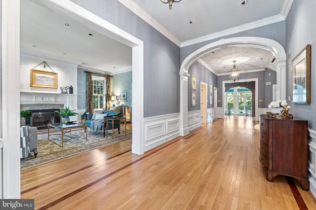 a kitchen with stainless steel appliances granite countertop wooden cabinets a sink and a stove