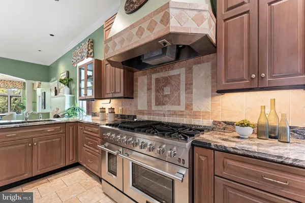 a spacious bedroom with a large bed and a large window