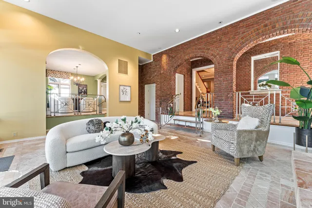 a bed room with a bed and a chair